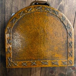 Art deco hat box. Brown leather with x stitching.